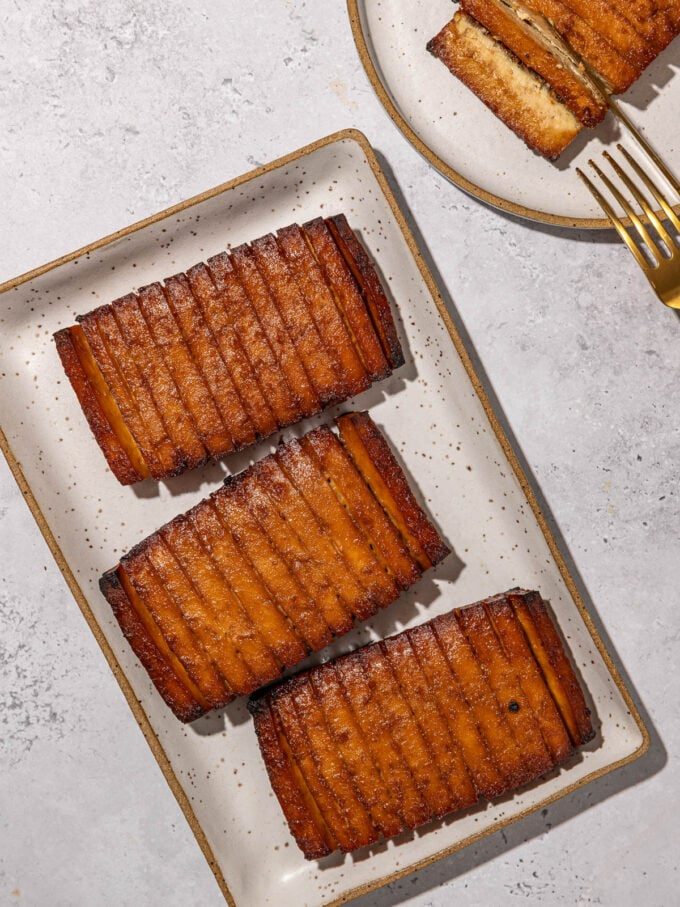 glazed tofu on white plate