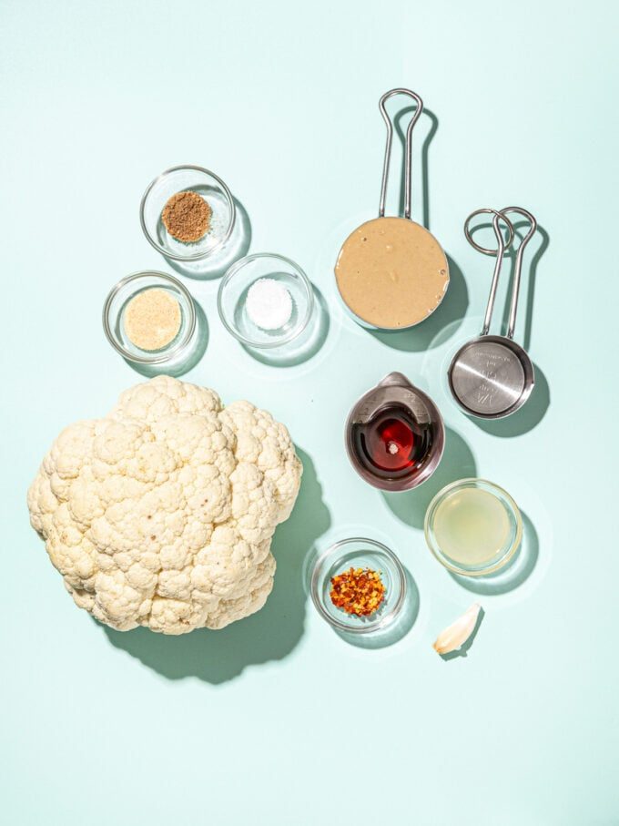 cauliflower, tahini and spices in bowls