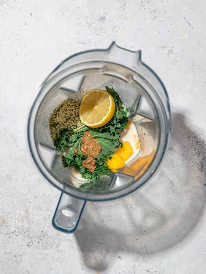 kale and lemon in a blender