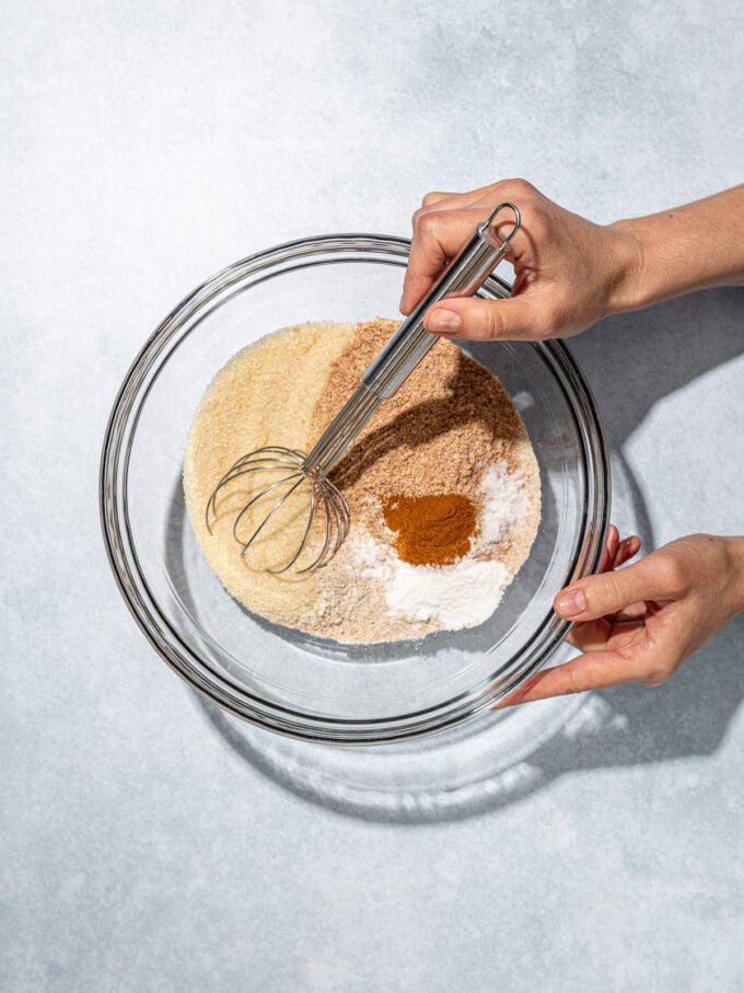 hand whisking flour