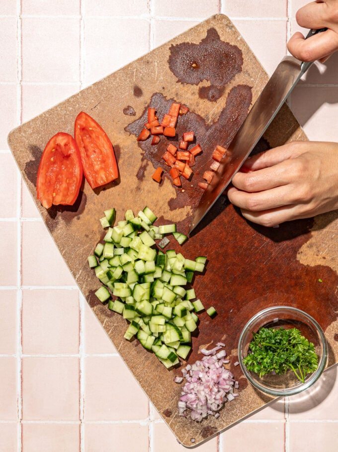 hand dicing tomato